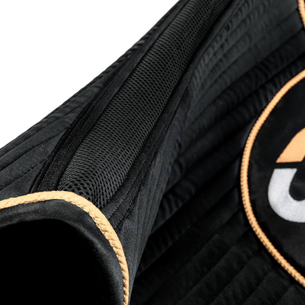 detailed view of air circulation on black golden sr line jumping saddle pad with breathable air mesh spine by sunride