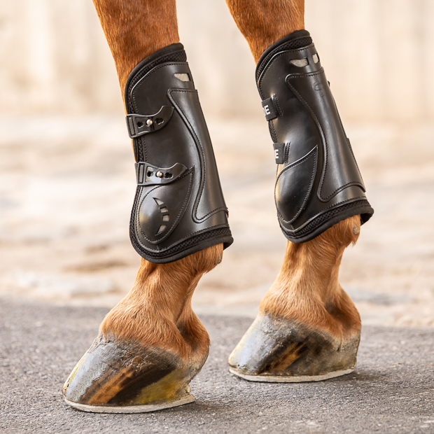 black leather jumping boots with elastic straps and safety net layer leather jumping boots black with neoprene inside and elastic straps and safety net layer by sunride