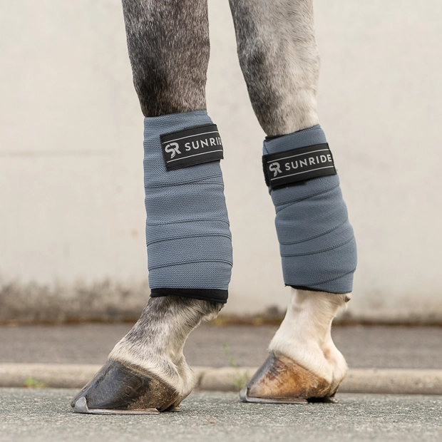 set of four elastic fleece bandages sunride blue on horse leg