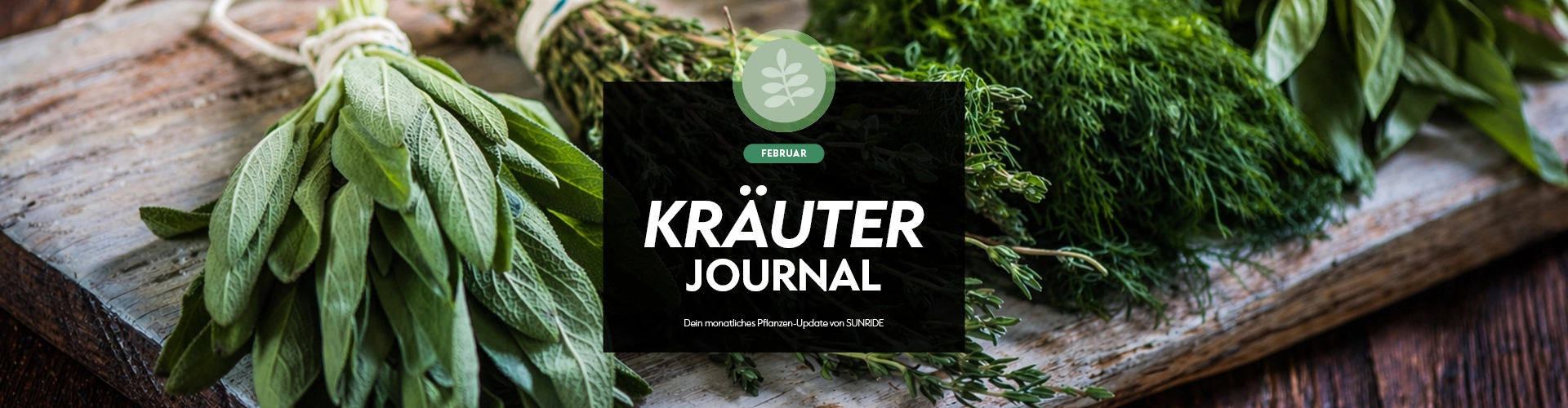 A variety of fresh herbs including sage, dill, and basil are arranged on a wooden surface with a dark background featuring the text Kräuter Journal.