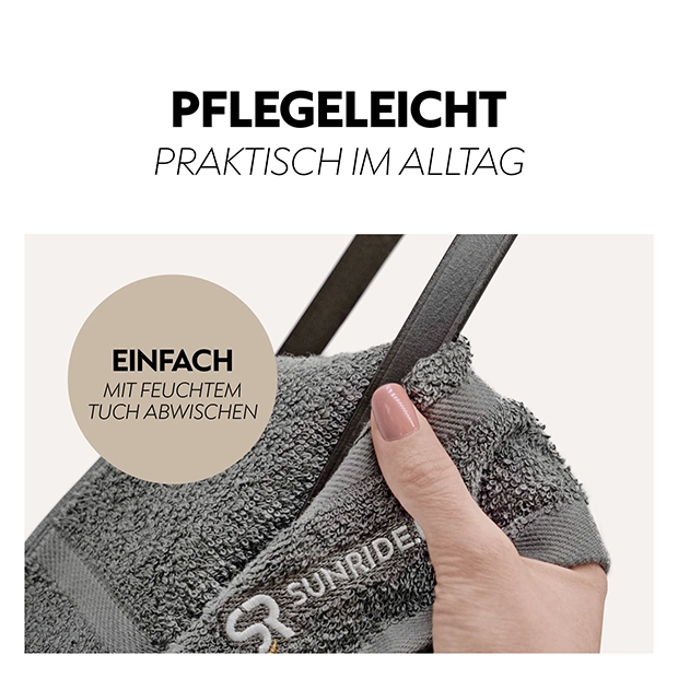 A person is holding a soft gray cleaning cloth with a strap, demonstrating its easy maintenance by wiping it with a damp cloth.